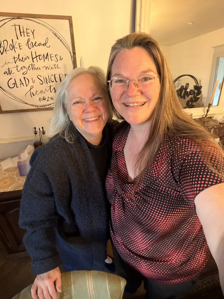 Two members of the Hope on a Hill family smiling together