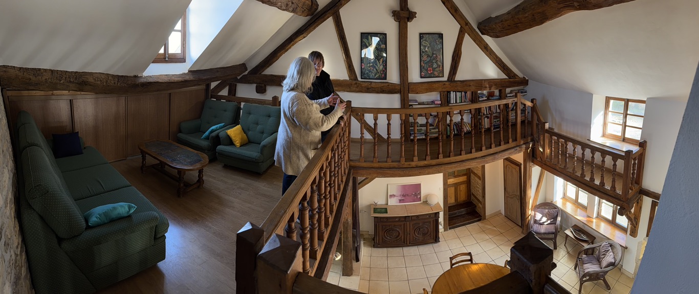 Mezzanine sitting area looking down into the living room